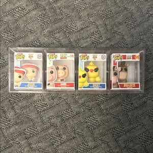 Funko Pop Toy Story Figures - Red, Blue, Yellow, Brown